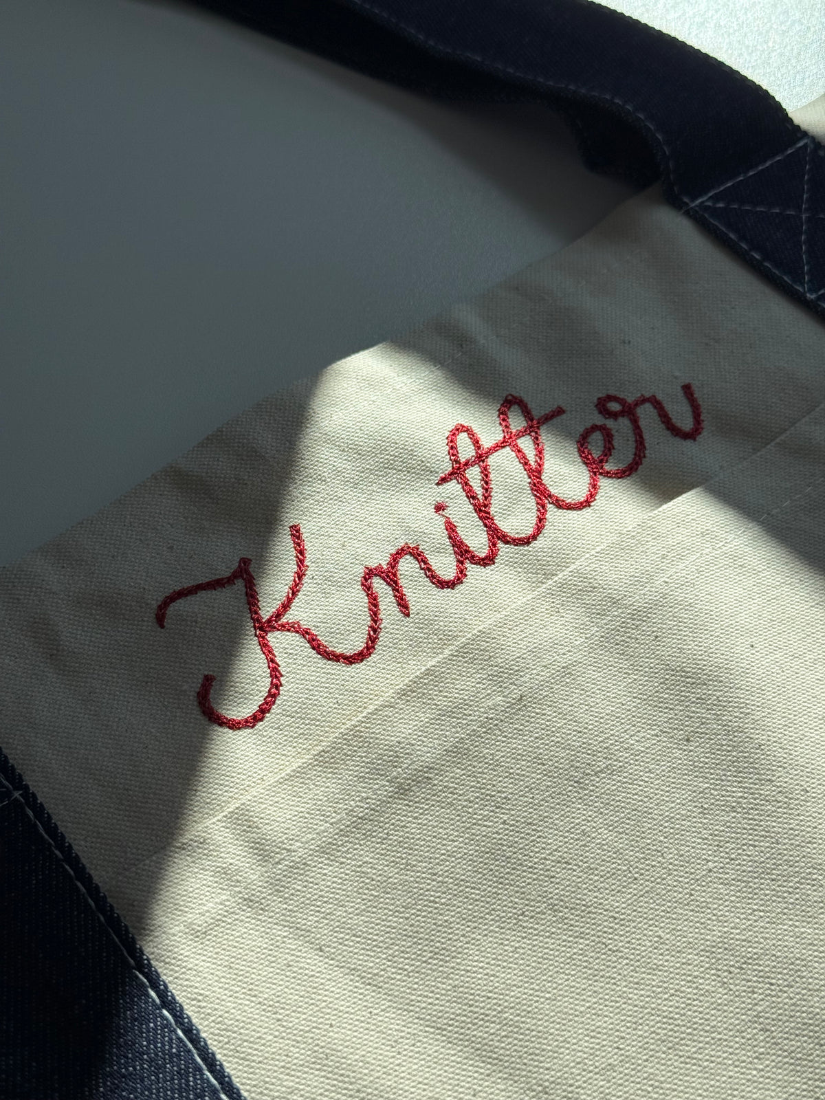 Knitter Dark Denim + Natural Canvas XL Pocket Tote – Dark Red Chainstitch Embroidery