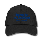 Black cap with 'resting stitch face' text in blue on a white background