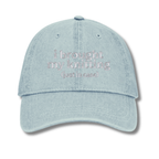 Light blue cap with 'resting stitch face' text on a white background