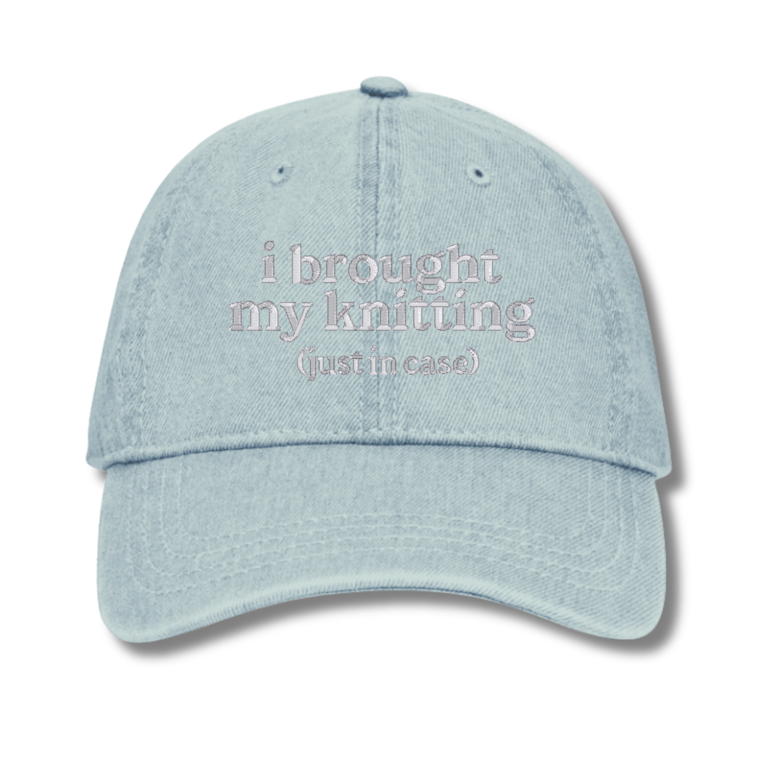 Light blue cap with 'resting stitch face' text on a white background