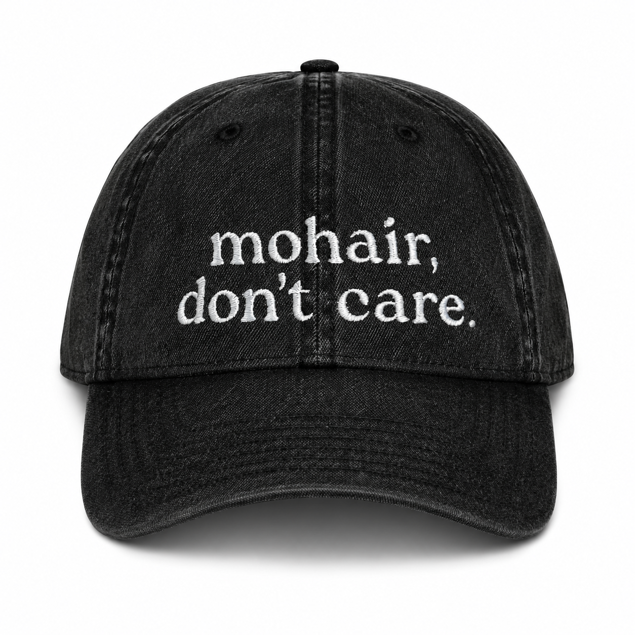 Black cap with 'mohair, don't care' text on a white background