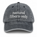 Gray cap with 'natural fibers only' text on a white background