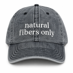 Gray cap with 'natural fibers only' text on a white background