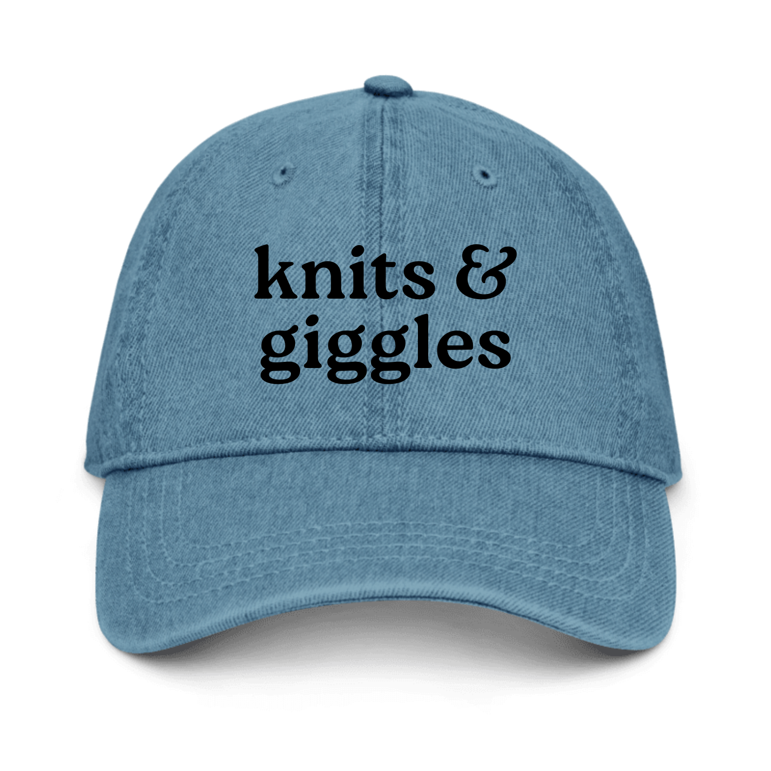 Blue cap with 'knits & giggles' text on a white background