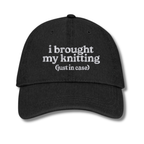 Black cap with 'resting stitch face' text on a white background
