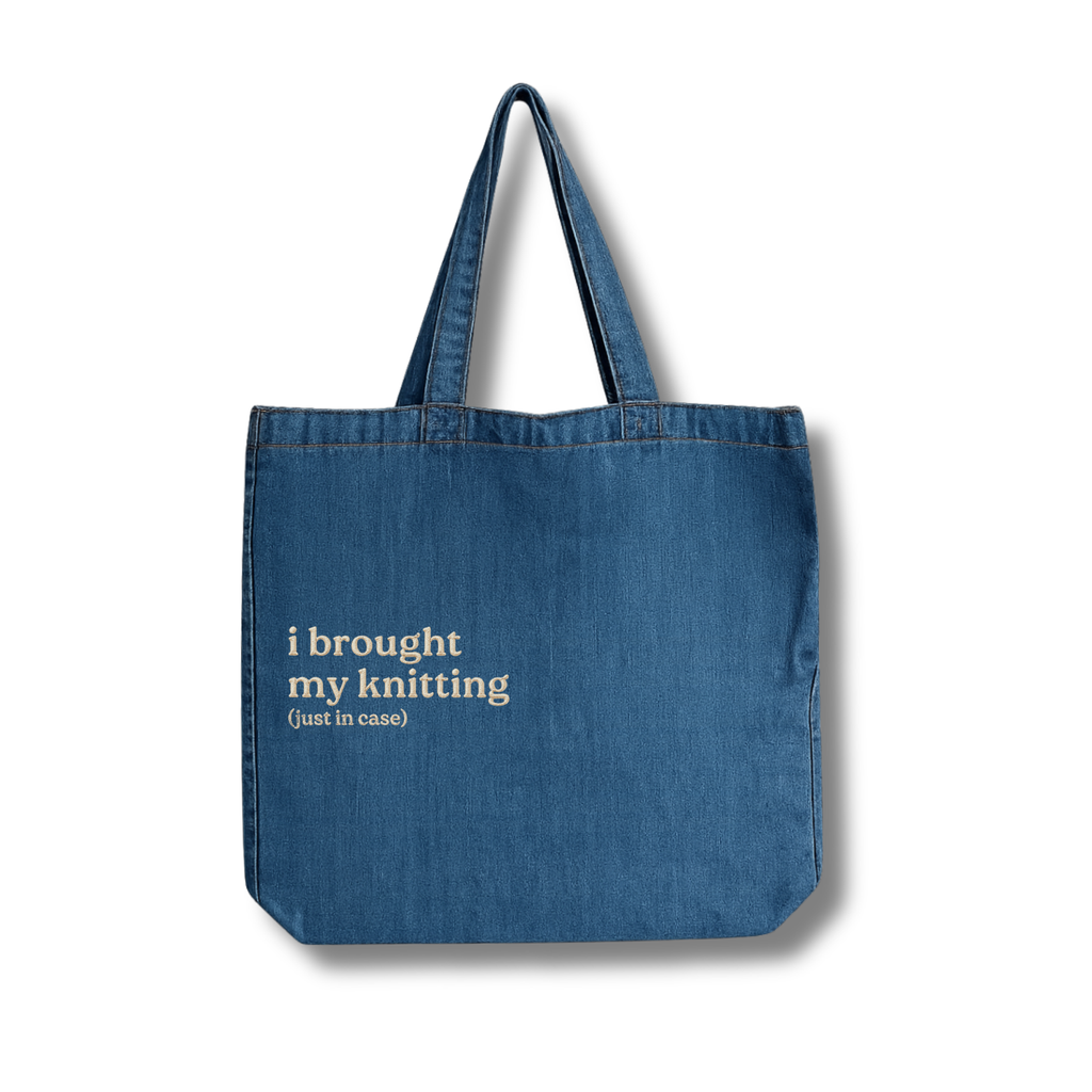 Blue tote bag with text on a white background