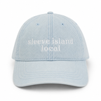 Light blue cap with 'sleeve island local' text on a white background