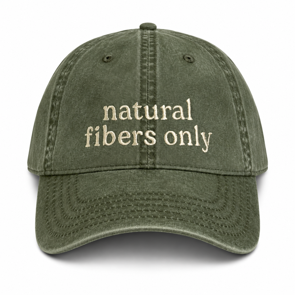 Green cap with 'natural fibers only' text on a white background