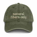 Green cap with 'natural fibers only' text on a white background