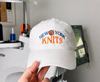 New York Knits – White Cotton Dad Hat – Blue + Orange Embroidery