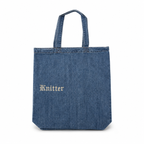 Blue denim tote bag with 'Knitter' embroidery on a white background