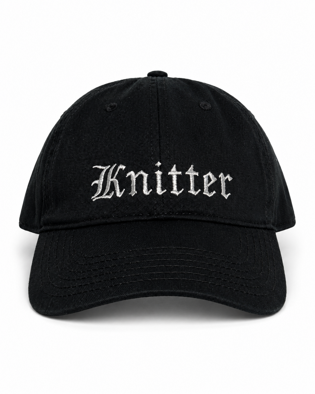 Black cap with 'Knitter' embroidered on a white background