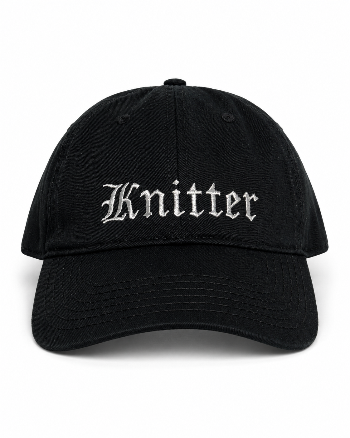 Black cap with 'Knitter' embroidered on a white background