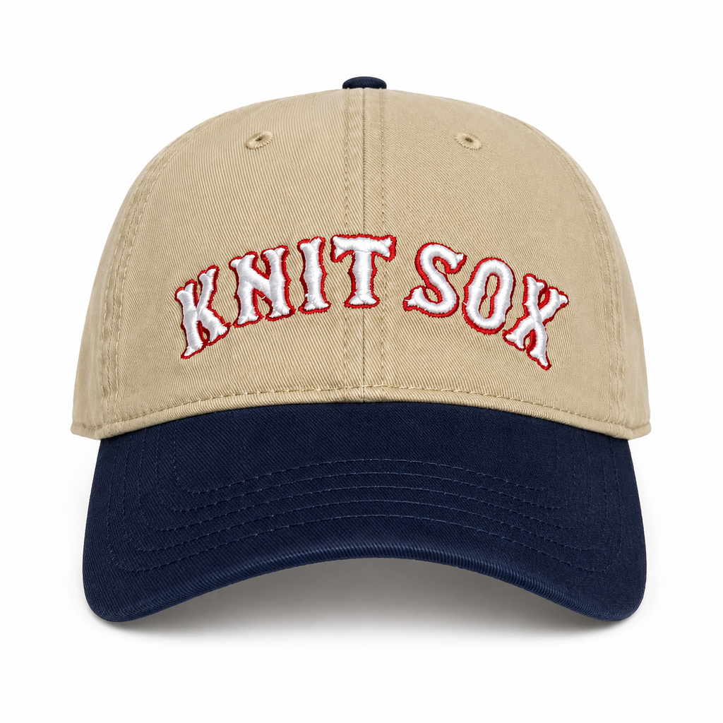 Khaki and navy split crown hat with red Knit Sox embroidery and white puff embroidery