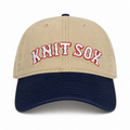 Khaki and navy split crown hat with red Knit Sox embroidery and white puff embroidery
