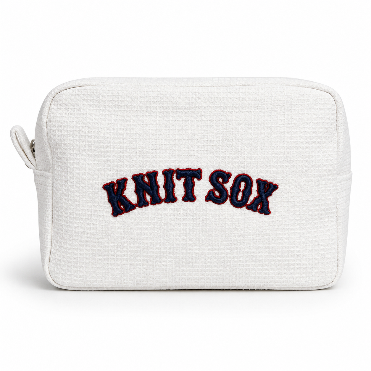 White zip pouch with red Knit Sox embroidery and navy 3D puff detail