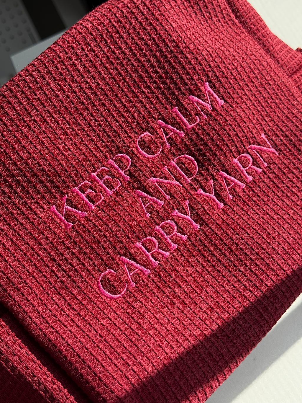 Keep Calm and Carry Yarn Cranberry Premium Waffle Pouch – Pink Embroidery