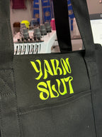 Yarn Slut Black Stash Tote with neon green groove embroidery