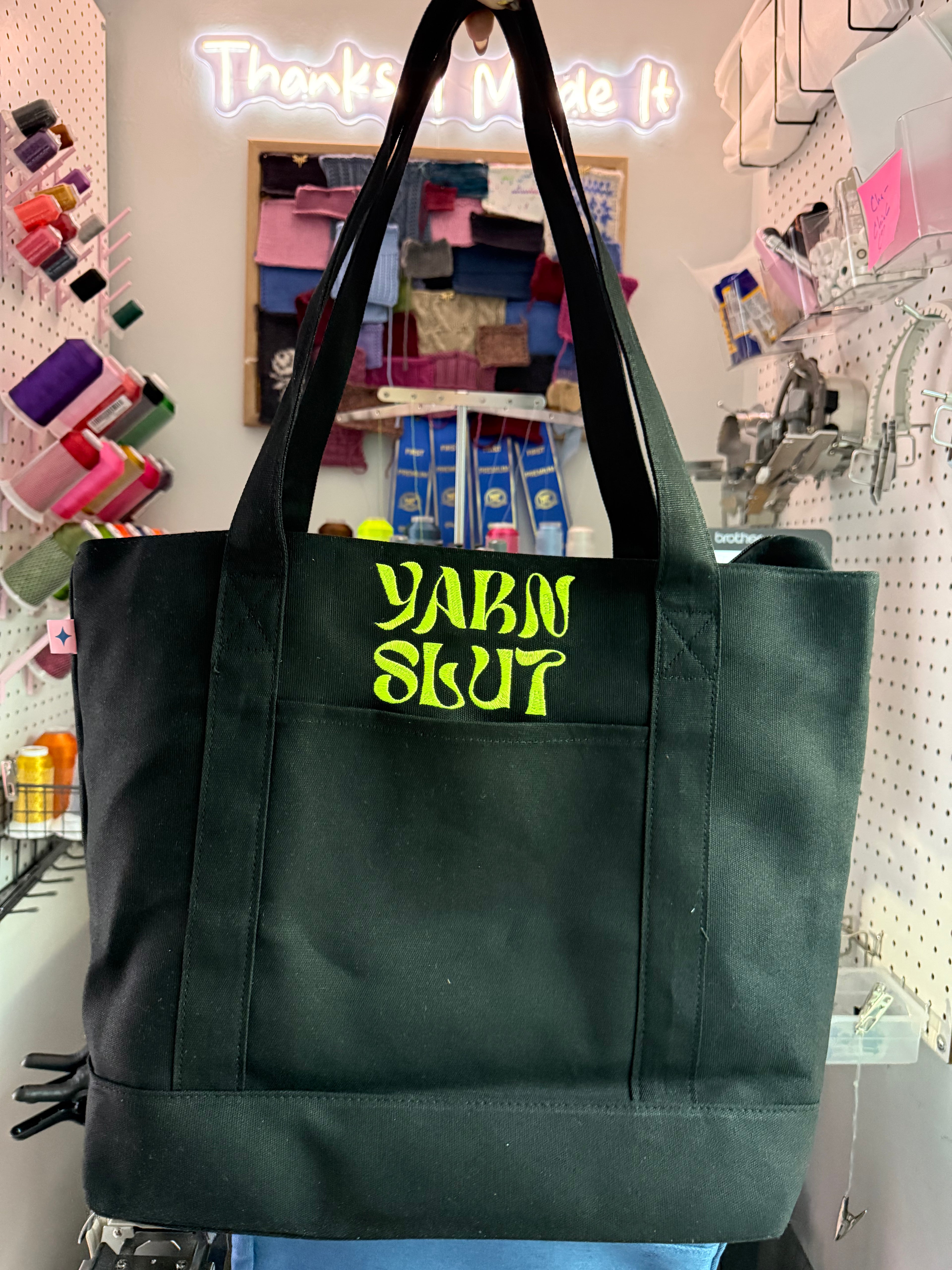 Yarn Slut Black Stash Tote with neon green groove embroidery – alternate view