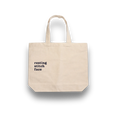 Beige tote bag with 'resting stitch face' text on a white background