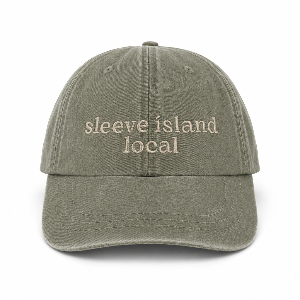 Green cap with 'sleeve island local' text on a white background