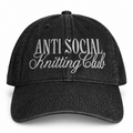 Black denim hat with gray “Anti Social Knitting Club” embroidery.