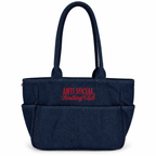 A dark navy blue denim tote bag with red embroidered text reading 'ANTI SOCIAL Knitting Club' on the front, set against a plain white background.
