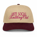 Khaki and burgundy structured hat with dark pink Anti Social Knitting Club embroidery