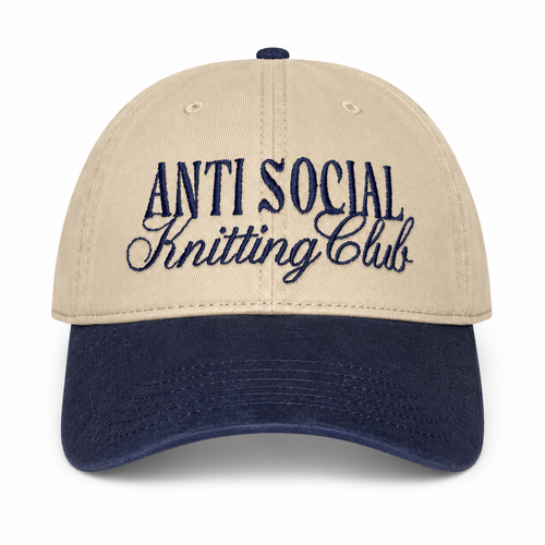 Khaki and navy cotton dad hat with navy Anti Social Knitting Club embroidery