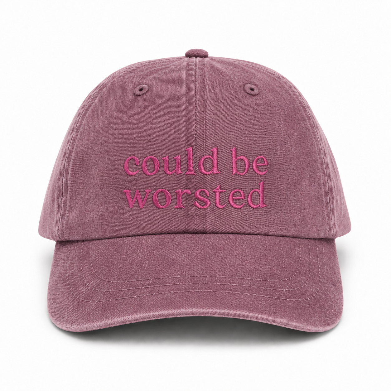 Mauve cap with 'could be worsted' text on a white background