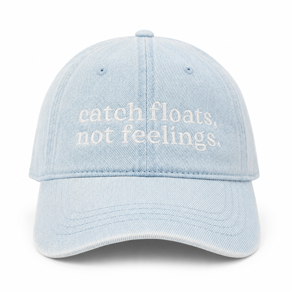 Light blue cap with white text 'catch floats, not feelings' on a white background