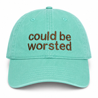 Turquoise dad hat with chocolate brown sans Could Be Worsted embroidery