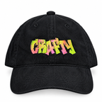 A black corduroy baseball cap featuring the word 'CRAFTY' embroidered across the front in a vibrant, multicolored graffiti-style font with pink, orange, yellow, and green hues, set against a plain white background.