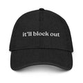 Black cap with 'it'll block out' text on a white background
