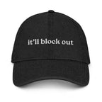 Black cap with 'it'll block out' text on a white background