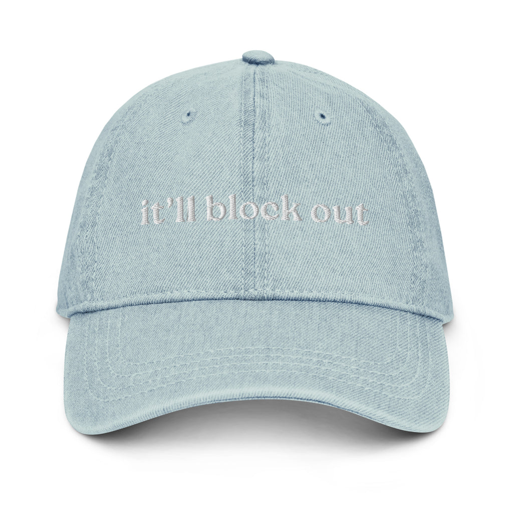 Light blue cap with 'it'll block out' text on a white background