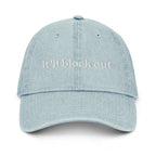 Light blue cap with 'it'll block out' text on a white background