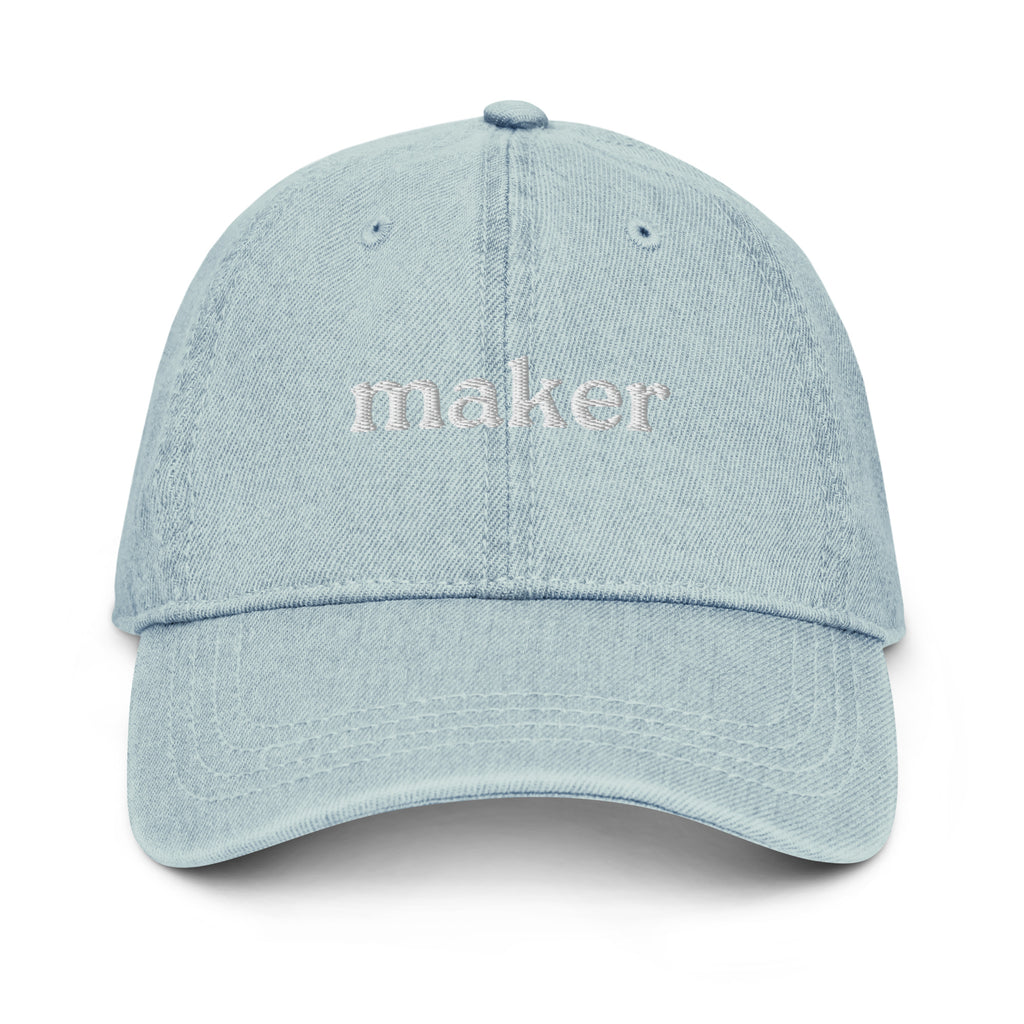Light blue cap with 'maker' text on a white background