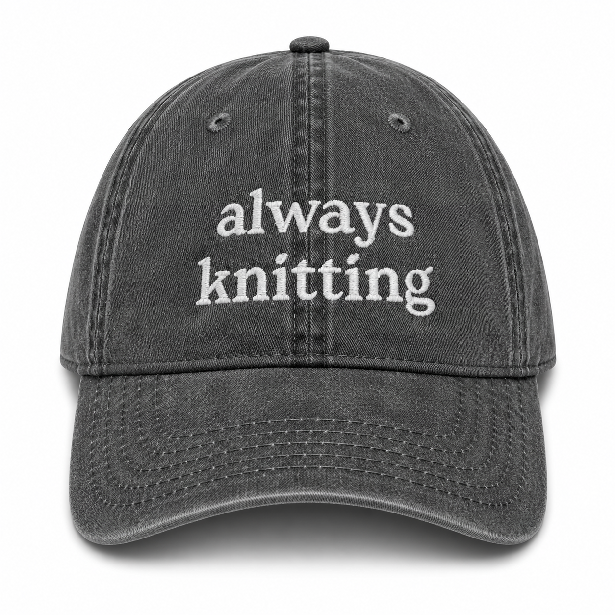 Gray cap with 'always knitting' text on a white background