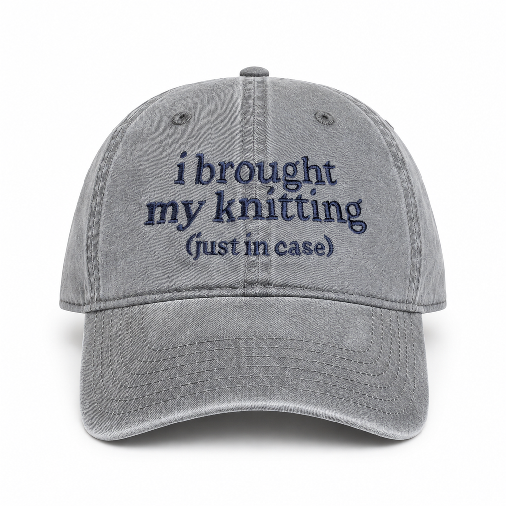Gray cap with embroidered text on a white background
