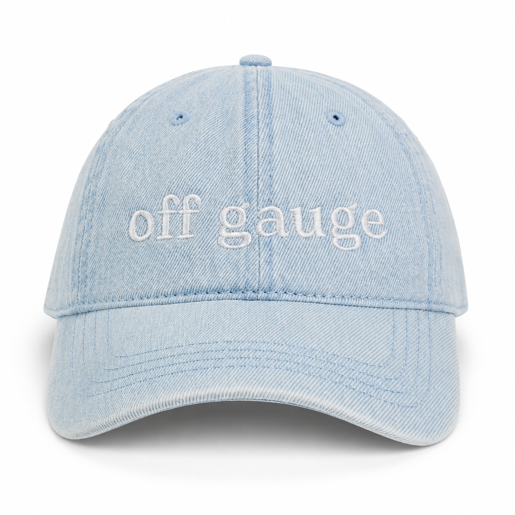 Light blue denim cap with 'off gauge' text on a white background