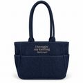 Dark denim TIMI Tote with taupe “I brought my knitting (just in case)” embroidery.
