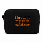 Black waffle zip pouch with orange I Brought My Yarn Just In Case embroidery
