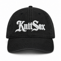 Black denim hat with Knit Sox white puff embroidery and metallic silver embroidered detail