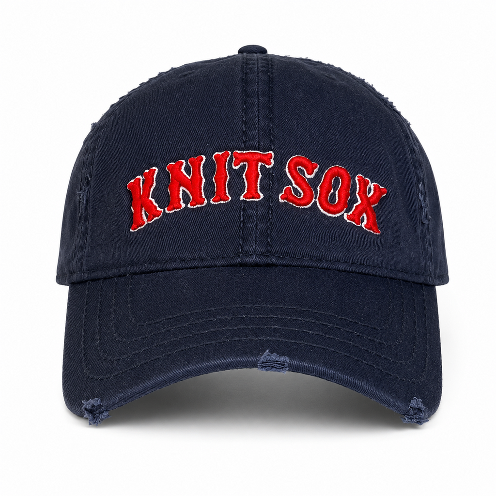 Navy distressed washed cotton hat with Knit Sox red puff embroidery and white embroidered detail