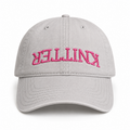 Grey hat with pink puff embroidered upside-down Knitter lettering