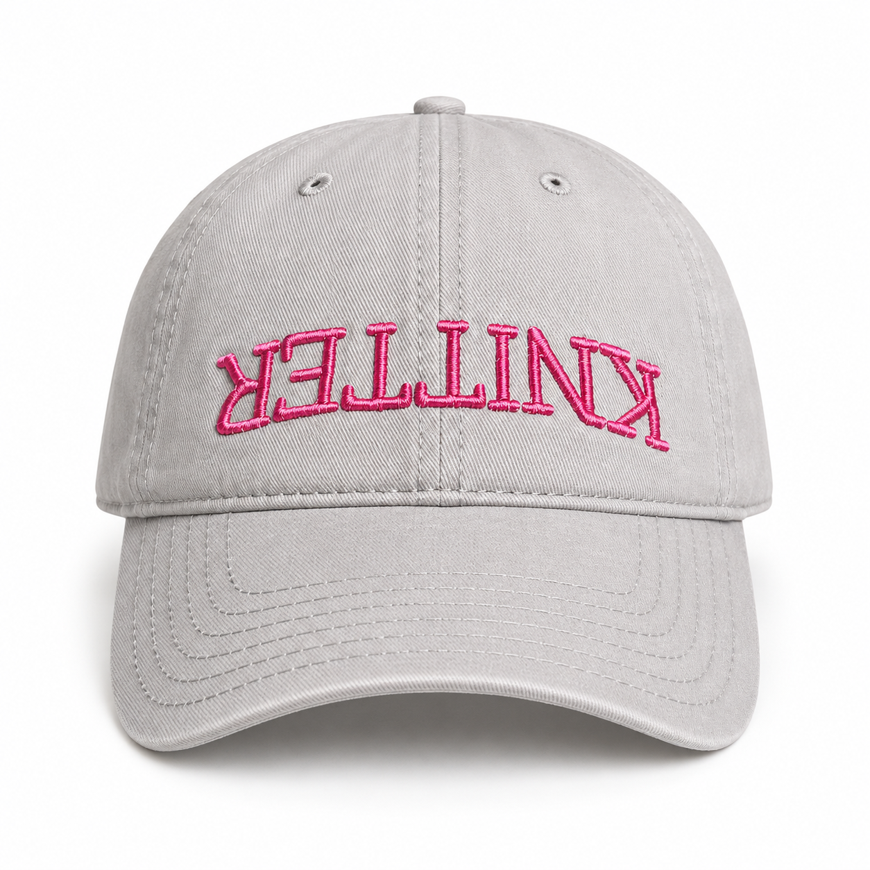 Grey hat with pink puff embroidered upside-down Knitter lettering