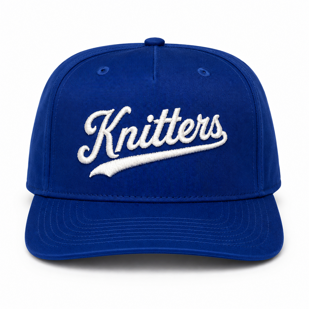 Royal blue structured hat with white Knitters embroidery in a sporty script design