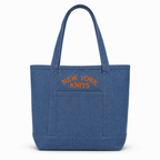 Denim tote bag with orange New York Knits embroidery above the front pocket