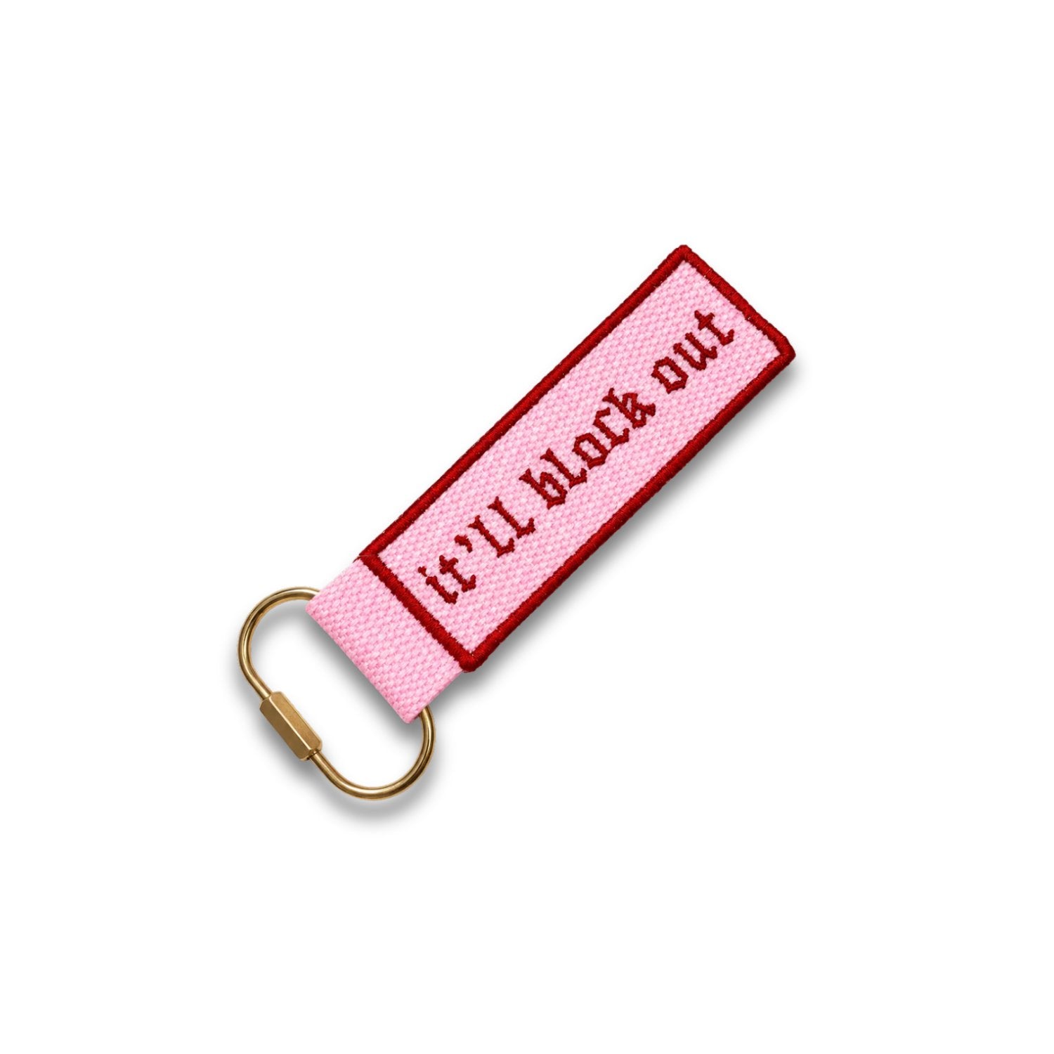 Pink keychain with gold carabiner and text on a white background
